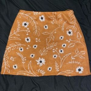 Extra small suede Francecas’ skirt with floral print